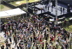 Crowd gathered outdoors on campus